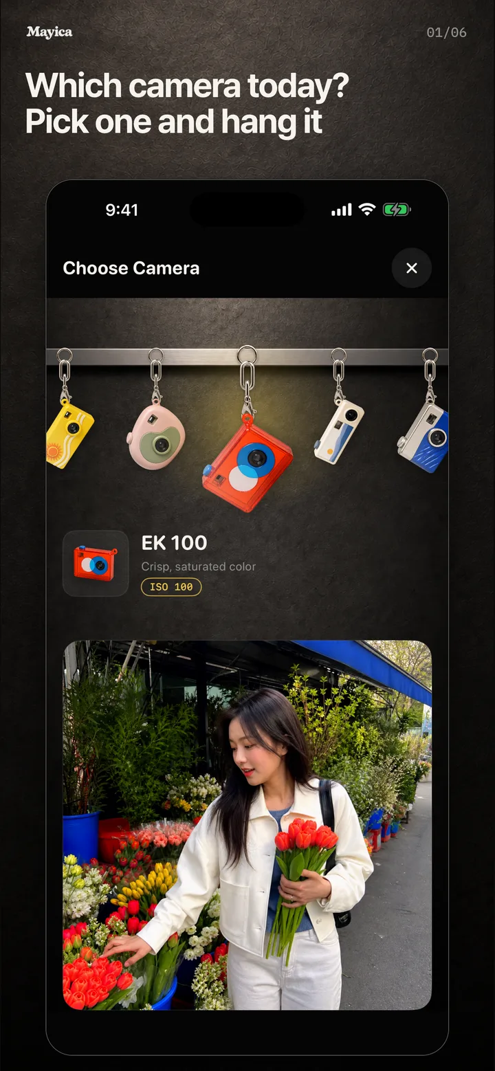 The camera picker: keyring cameras hang from a steel rail above a photo taken with the selected camera.